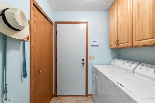 5472 Hancock St SW, Canton, OH 44706 - washroom featuring cabinet space, independent washer and dryer, and baseboards