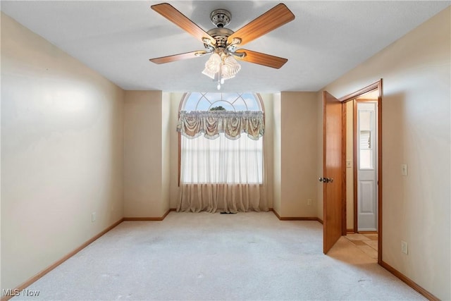 5472 Hancock St SW, Canton, OH 44706 - carpeted empty room with a ceiling fan and baseboards