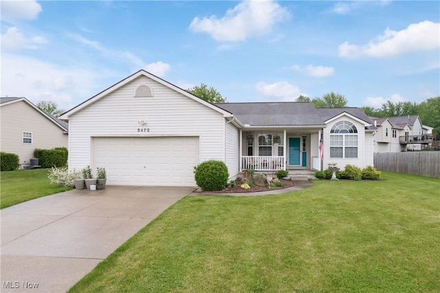 5472 Hancock St SW, Canton, OH 44706 - single story home with a porch, an attached garage, and driveway