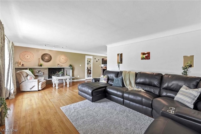 321 Justo Ln, Seven Hills, OH 44131 - living area featuring light wood-style floors and baseboards