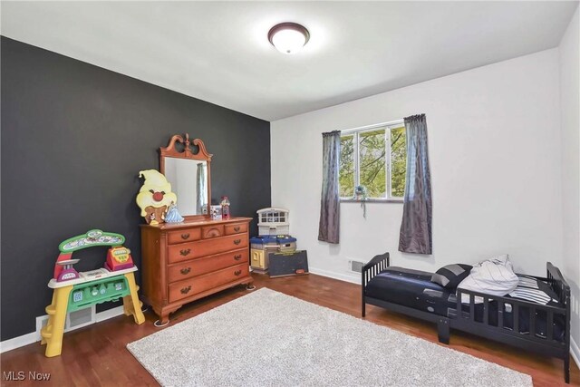 321 Justo Ln, Seven Hills, OH 44131 - sitting room with wood finished floors and baseboards