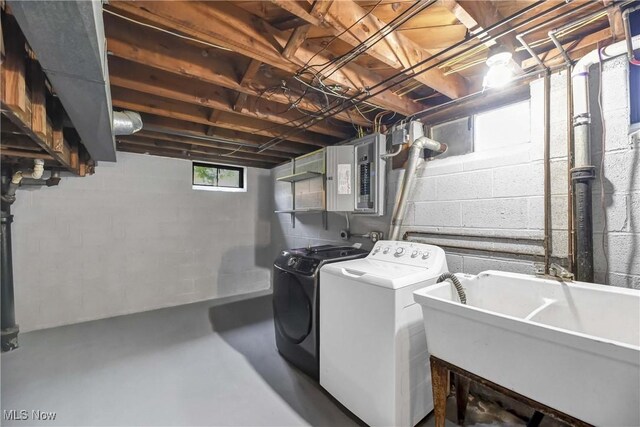 321 Justo Ln, Seven Hills, OH 44131 - laundry area featuring washing machine and dryer and electric panel