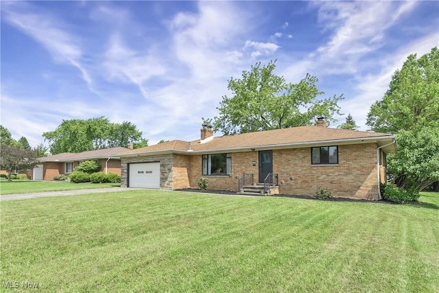 321 Justo Ln, Seven Hills, OH 44131 - single story home featuring a chimney, a garage, concrete driveway, and a front yard