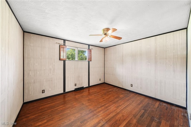 11828 Sheldon Rd, Mantua, OH 44255 - empty room featuring wood finished floors, ceiling fan, and baseboards