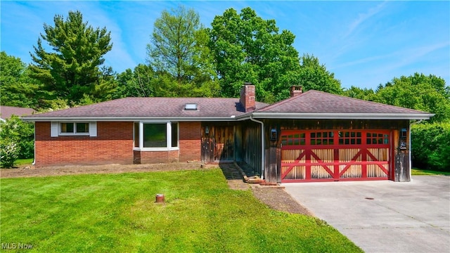 11828 Sheldon Rd, Mantua, OH 44255 - ranch-style home with an attached garage, a chimney, a front lawn, driveway, and brick siding
