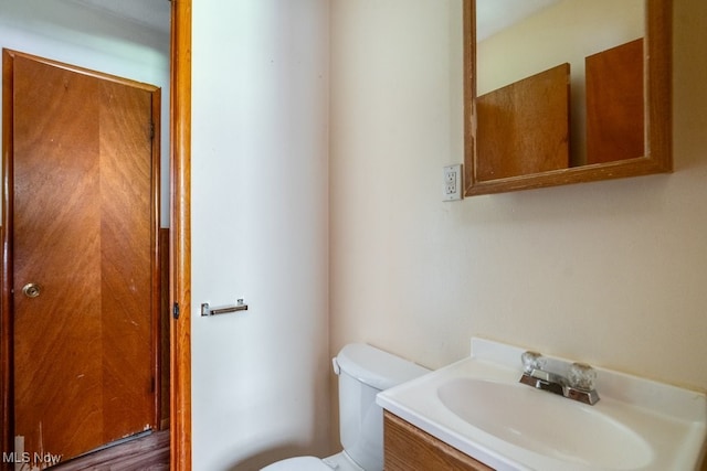 24120 Sherborne Rd, Bedford Heights, OH 44146 - bathroom featuring toilet and vanity