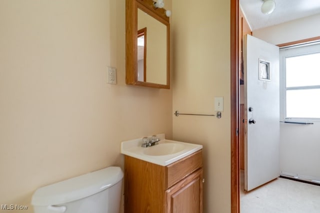 24120 Sherborne Rd, Bedford Heights, OH 44146 - bathroom featuring toilet and vanity