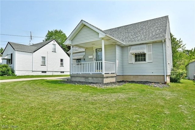 859 Gary Ave, Girard, OH 44420 - view of front of home featuring covered porch, a shingled roof, and a front lawn