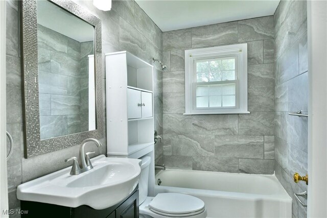 859 Gary Ave, Girard, OH 44420 - full bathroom with toilet, vanity, and shower / bathtub combination