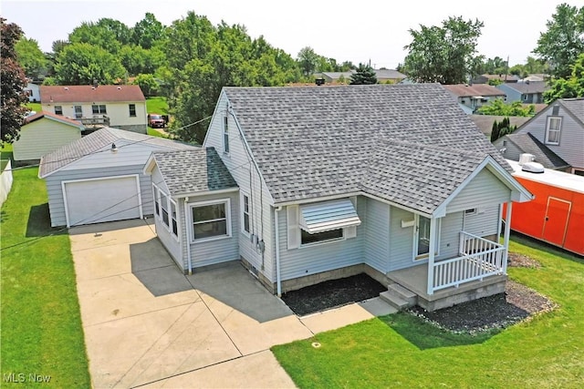 859 Gary Ave, Girard, OH 44420 - view of front of home featuring roof with shingles, a front lawn, driveway, and a residential view