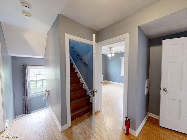 18515 Lomond Blvd, Shaker Heights, OH 44122 - stairs featuring hardwood / wood-style floors, a ceiling fan, and baseboards