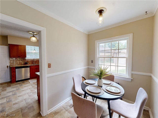 18515 Lomond Blvd, Shaker Heights, OH 44122 - dining space with healthy amount of natural light, stone finish floors, ornamental molding, and baseboards