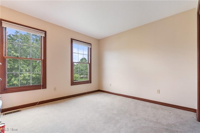 1103 Stone Crossing St NE, Canton, OH 44721 - carpeted empty room featuring baseboards