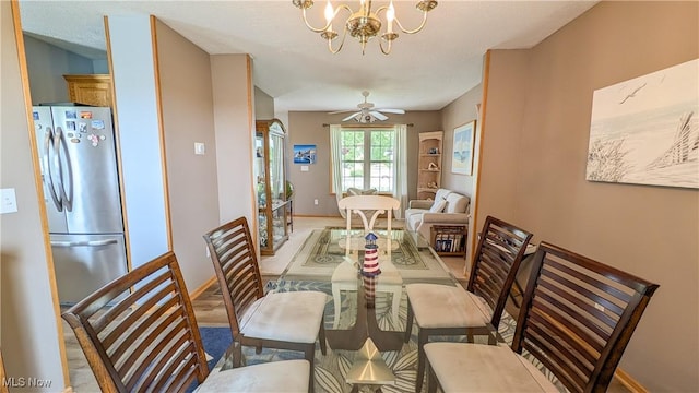 813 Buckeye Ln, Sandusky, OH 44870 - dining area with a chandelier and baseboards