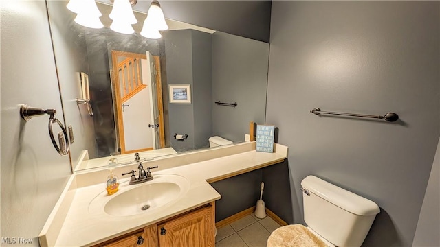 813 Buckeye Ln, Sandusky, OH 44870 - bathroom with toilet, tile patterned flooring, vanity, and a chandelier