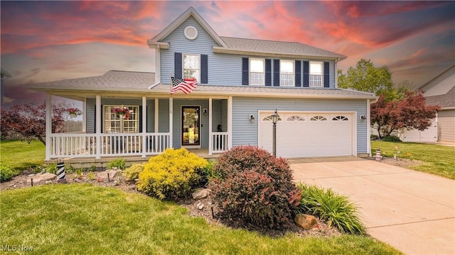 813 Buckeye Ln, Sandusky, OH 44870 - view of front of house with a porch, a garage, driveway, and a yard