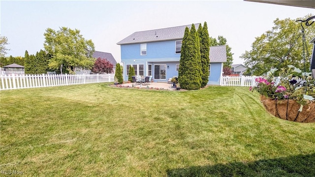 813 Buckeye Ln, Sandusky, OH 44870 - back of property with a patio