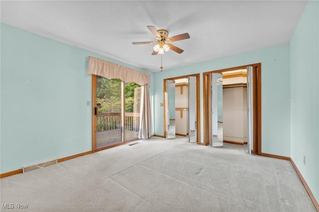6791 Cedar Ridge Trl, Clinton, OH 44216 - unfurnished bedroom with access to outside, carpet floors, and baseboards