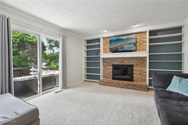 4610 Briarcliff Trl, Copley, OH 44321 - carpeted living area with built in shelves, a textured ceiling, baseboards, ornamental molding, and a brick fireplace