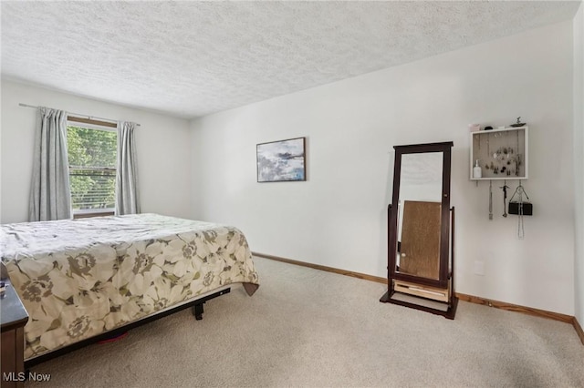 4610 Briarcliff Trl, Copley, OH 44321 - bedroom featuring carpet floors, a textured ceiling, and baseboards