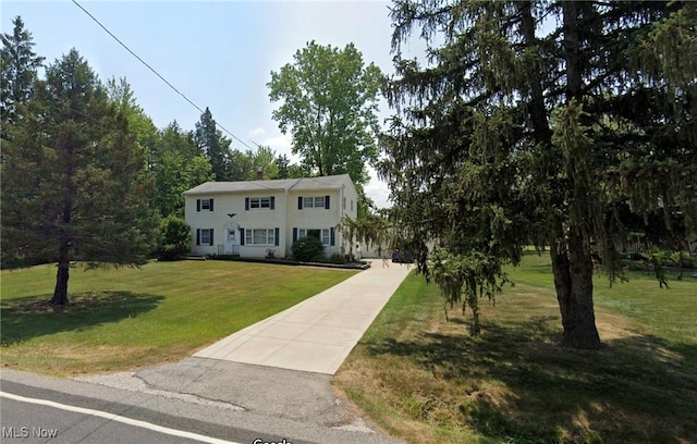 10031 Akins Rd, North Royalton, OH 44133 - colonial-style house featuring a front yard and driveway