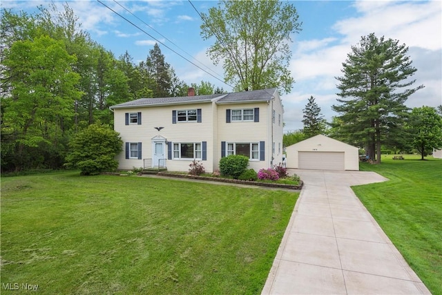 10031 Akins Rd, North Royalton, OH 44133 - colonial-style house featuring an outbuilding, a garage, a chimney, and a front yard