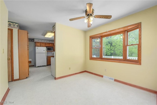 10031 Akins Rd, North Royalton, OH 44133 - empty room featuring baseboards and ceiling fan