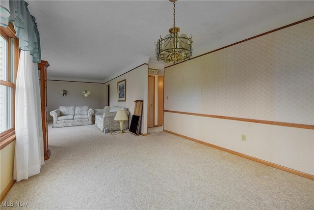 10031 Akins Rd, North Royalton, OH 44133 - unfurnished living room featuring a chandelier and carpet floors