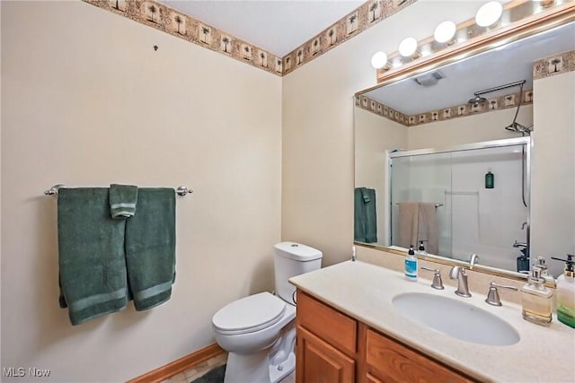 402 Tournament Trl, Cortland, OH 44410 - bathroom featuring a shower stall, vanity, and toilet