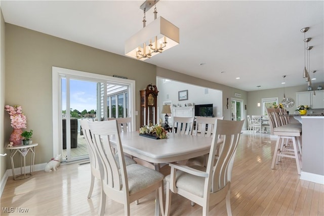 5325 S Island Dr NW, Canton, OH 44718 - dining room featuring plenty of natural light, light wood-style flooring, baseboards, and recessed lighting