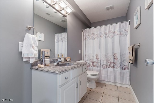 5325 S Island Dr NW, Canton, OH 44718 - full bathroom featuring toilet, vanity, tile patterned floors, and curtained shower