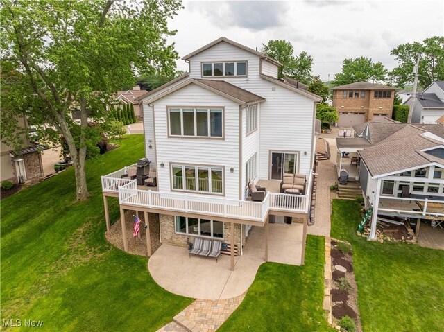 5325 S Island Dr NW, Canton, OH 44718 - back of house featuring a patio area, a deck, a yard, and outdoor lounge area