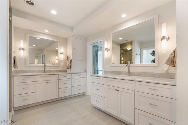 5325 S Island Dr NW, Canton, OH 44718 - bathroom featuring two vanities and recessed lighting