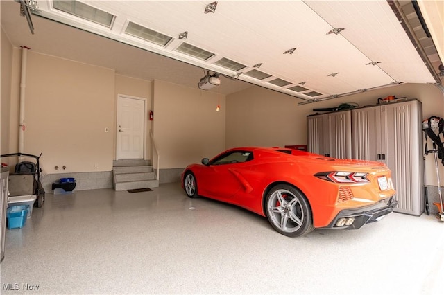 5325 S Island Dr NW, Canton, OH 44718 - garage featuring a garage door opener