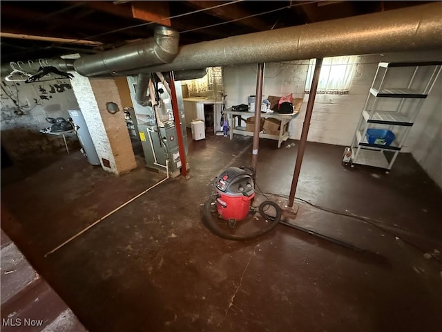 249 S 15th St, Sebring, OH 44672 - unfinished basement featuring heating unit