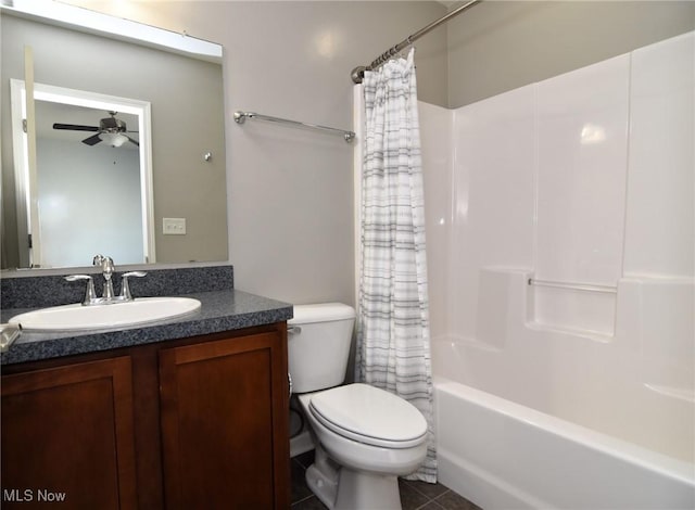 1261 W 74, Cleveland, OH 44102 - full bathroom with toilet, vanity, ceiling fan, shower / tub combo with curtain, and tile patterned floors