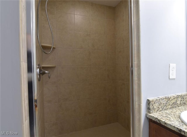 1261 W 74, Cleveland, OH 44102 - full bathroom with a tile shower and vanity