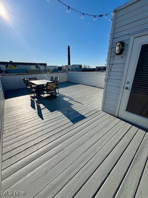 1261 W 74, Cleveland, OH 44102 - wooden deck with outdoor dining space