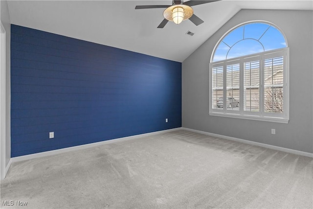 4004 Coventry Ln, Huron, OH 44839 - carpeted spare room with a ceiling fan, vaulted ceiling, and baseboards