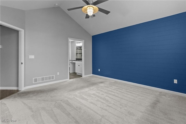 4004 Coventry Ln, Huron, OH 44839 - unfurnished bedroom with carpet floors, baseboards, a ceiling fan, high vaulted ceiling, and ensuite bathroom