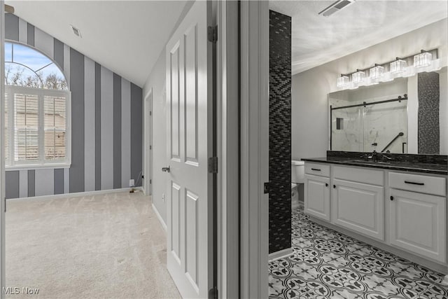 4004 Coventry Ln, Huron, OH 44839 - full bathroom with a stall shower, vanity, toilet, wallpapered walls, and baseboards