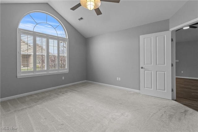 4004 Coventry Ln, Huron, OH 44839 - unfurnished room featuring a ceiling fan, lofted ceiling, carpet, and baseboards