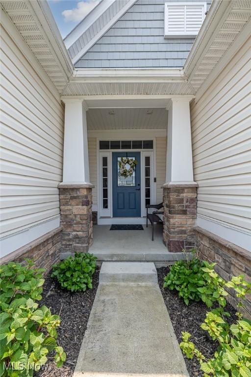 12136 White Tail Run, Columbia Station, OH 44028 - view of exterior entry featuring covered porch