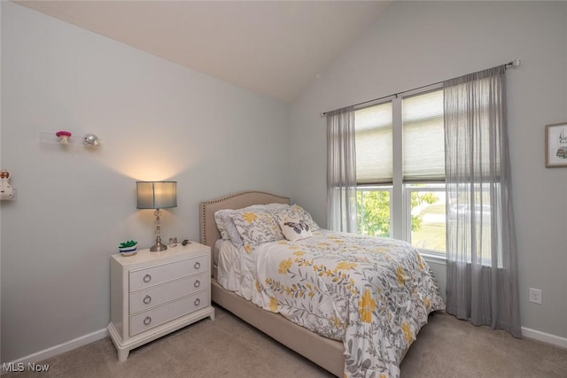 12136 White Tail Run, Columbia Station, OH 44028 - bedroom featuring light colored carpet, vaulted ceiling, and baseboards