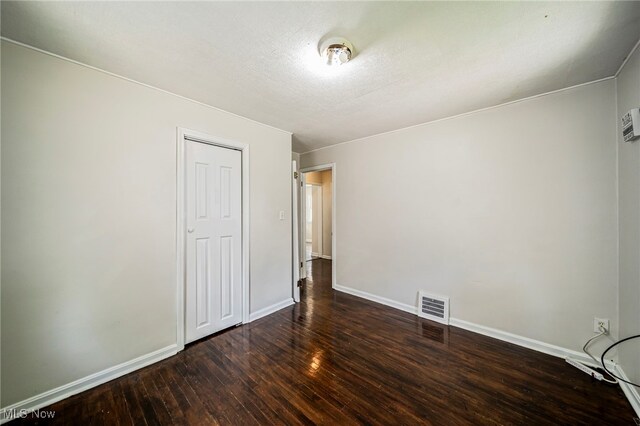 23701 Colbourne Rd, Euclid, OH 44123 - unfurnished bedroom featuring wood-type flooring and baseboards
