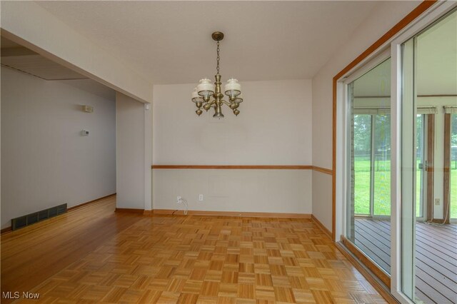 1214 Highwood Dr, New Franklin, OH 44216 - empty room with a chandelier and baseboards