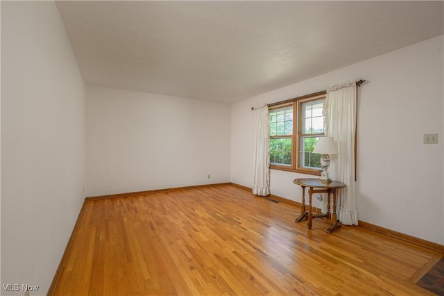 1214 Highwood Dr, New Franklin, OH 44216 - unfurnished room featuring light wood finished floors and baseboards
