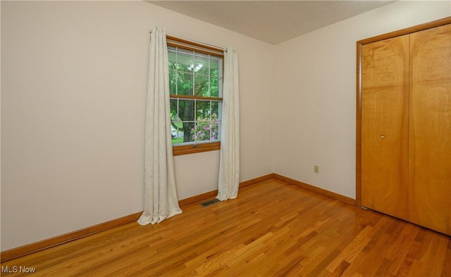 1214 Highwood Dr, New Franklin, OH 44216 - unfurnished bedroom with light wood finished floors and baseboards
