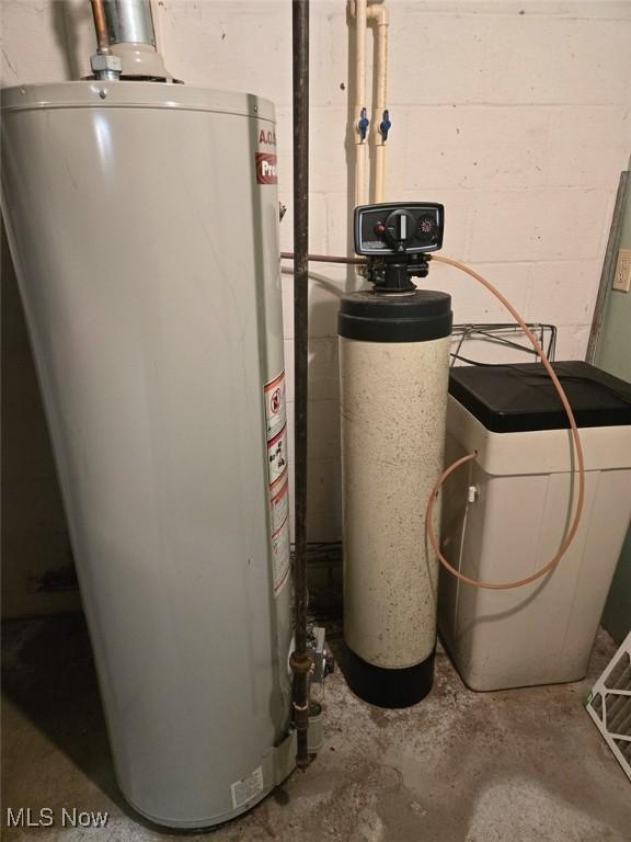 3212 Foxmoor St NE, Hartville, OH 44632 - utility room featuring water heater