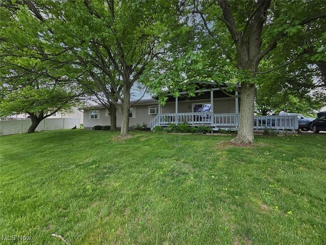 3212 Foxmoor St NE, Hartville, OH 44632 - back of house with a porch